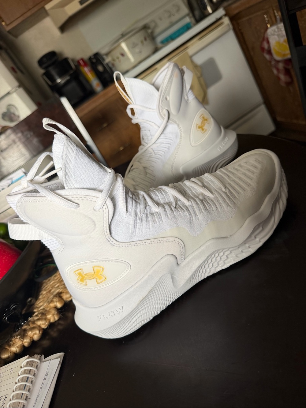 Under Armour women White High-Top Sneakers with size 9/10 in women’s